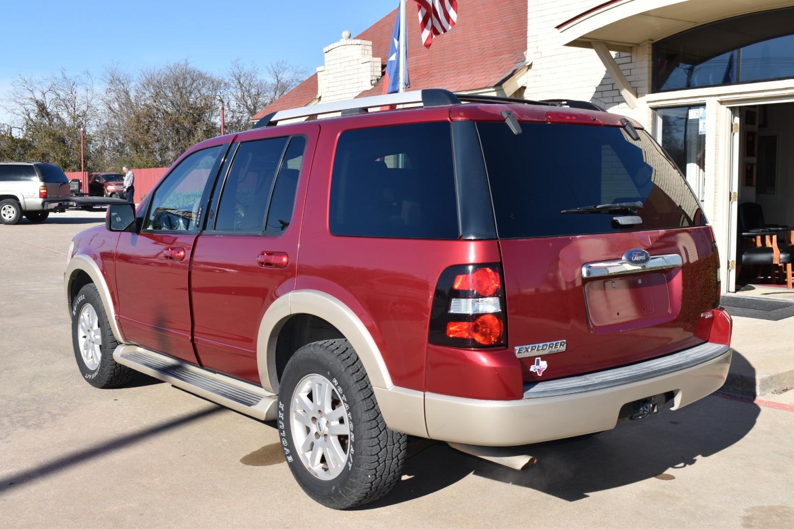 2006 Red /Tan Ford Explorer Eddie Bauer 4.0L 2WD (1FMEU64E76U) with an 4.0L V6 SOHC 16V engine, 5-Speed Automatic Overdrive transmission, located at 5925 E. BELKNAP ST., HALTOM CITY, TX, 76117, (817) 834-4222, 32.803799, -97.259003 - Buying a 2006 Ford Explorer can offer benefits such as affordability, availability of parts, spacious interior, towing capability, and off-road capability if equipped with the appropriate package. Additionally, older vehicles like the 2006 model may have simpler technology, making maintenance and re - Photo#2